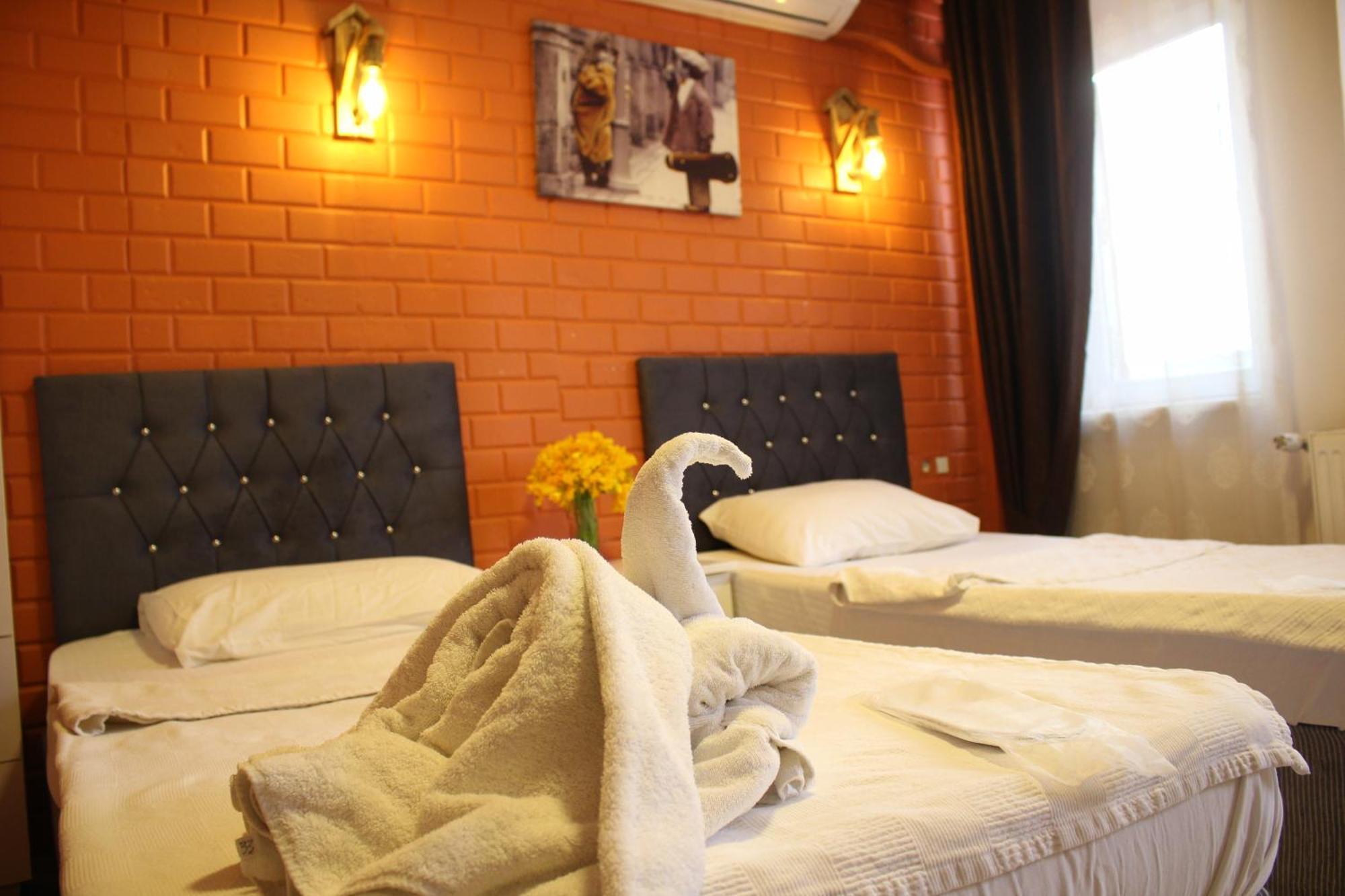 Taksim Bricktown Suite Istanbul Bagian luar foto